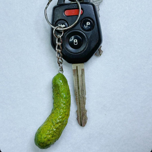 Pickle keychain attached to a car key fob